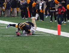 Herdina reaches over for the winning touchdown with :12 seconds left on the clock.