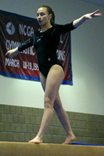 Amanda Parker performs on the balance beam.