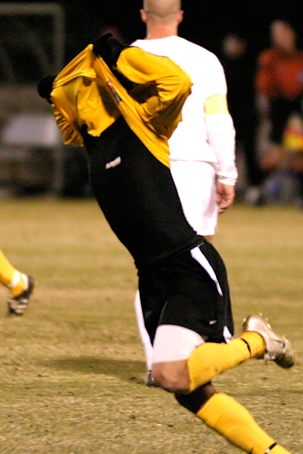 Sophomore Jeffrey Johnson celebrates after scoring the eventual game-winner against Whitworth