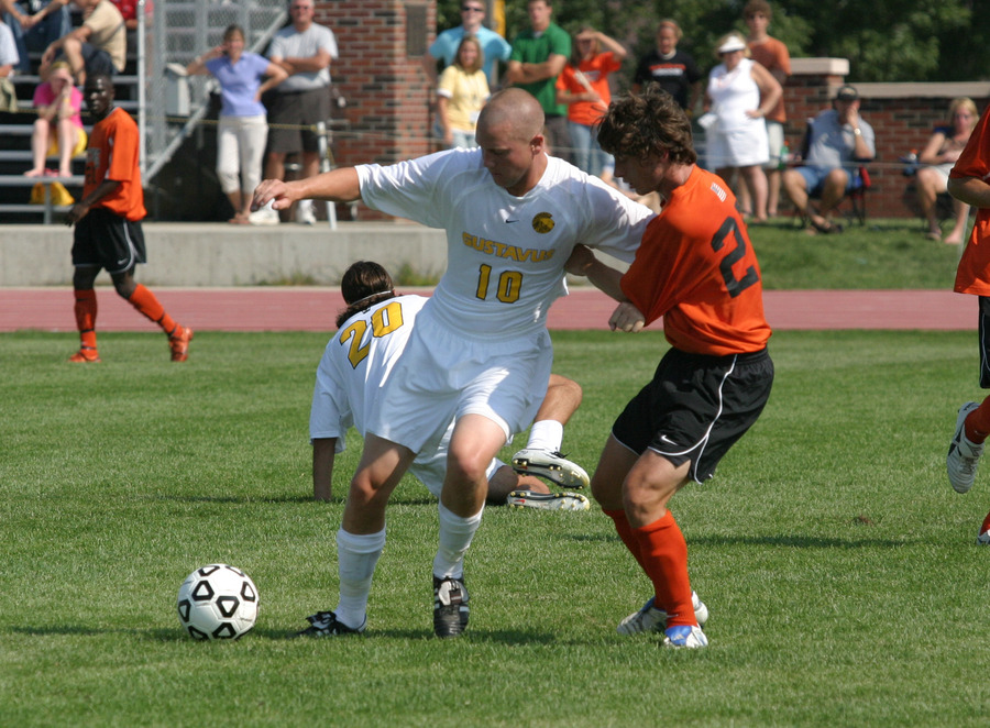 Bobby Kroog is challenged by a Wartburg defender during an early season game. 