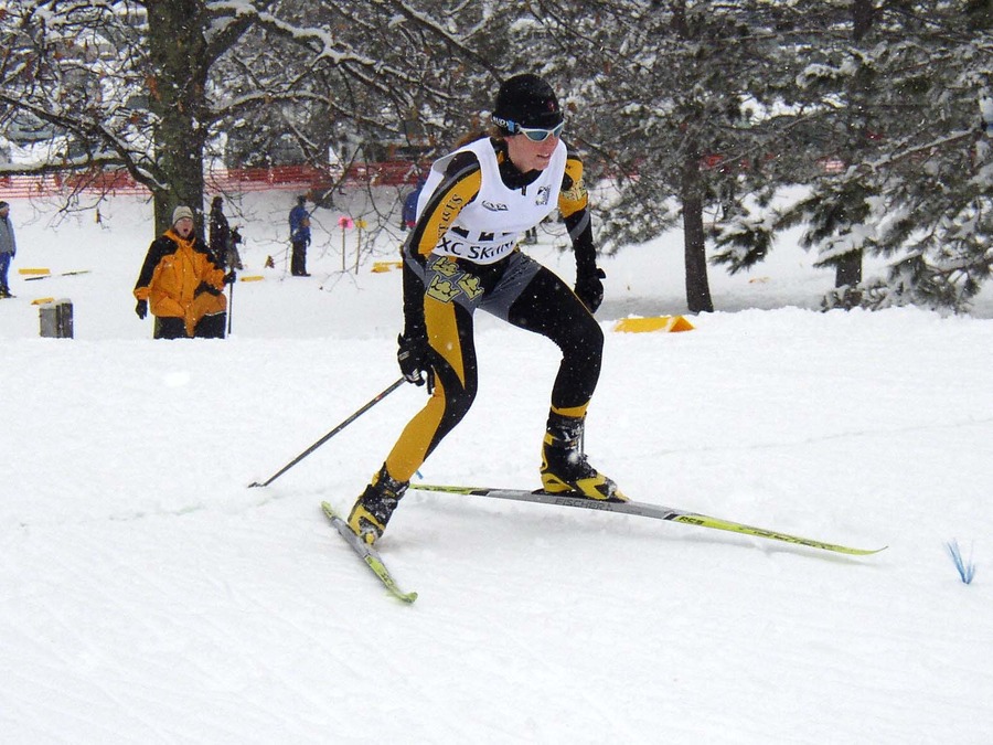 Senior Chandra Daw traverses the course at Telemark Resort near Cable, Wis.