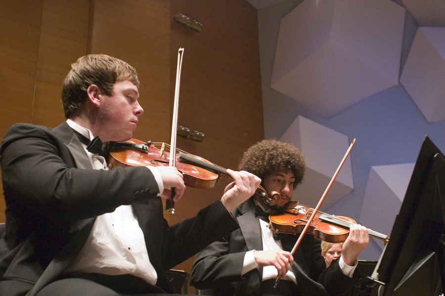 Colin McGuire and Mark Wamma perform with the Gustavus Symphony Orchestra.
