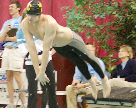 Tyler Wakefield lifts off as he takes his turn in the pool for the 400 freestyle relay.