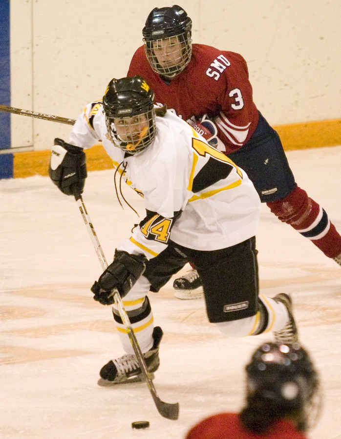 Liz Haakenson moving the puck up ice.