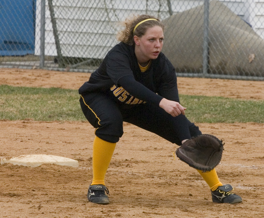Senior captain Tina Strauss gets set to field a ball at first base. 