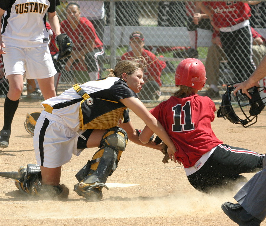 Abby Bernstein tags a Blazer runner out at home in game one.