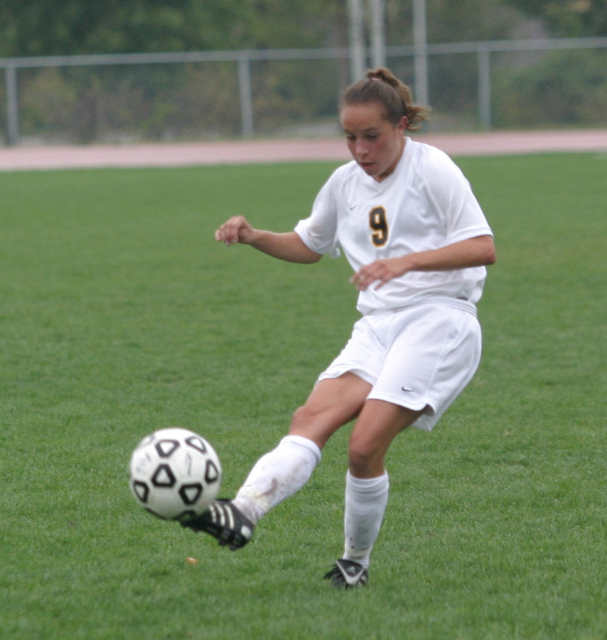 Tami Korb sends the ball up the field.