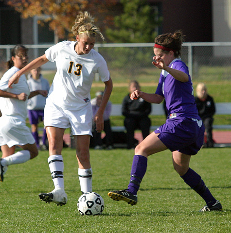 Jenna Iaizzo maneuvers for position against a St. Thomas defender.