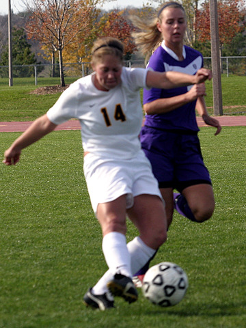 Defender Rachel Iblings sends the ball up the field.