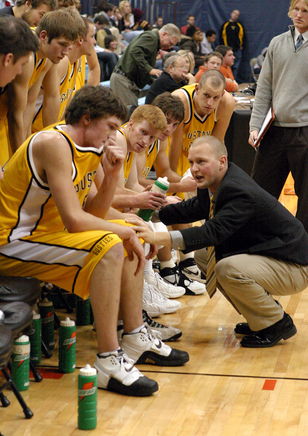 Assistant Coach Josh Drinkall sets the Gusties defensive strategy during a timeout late in the game.