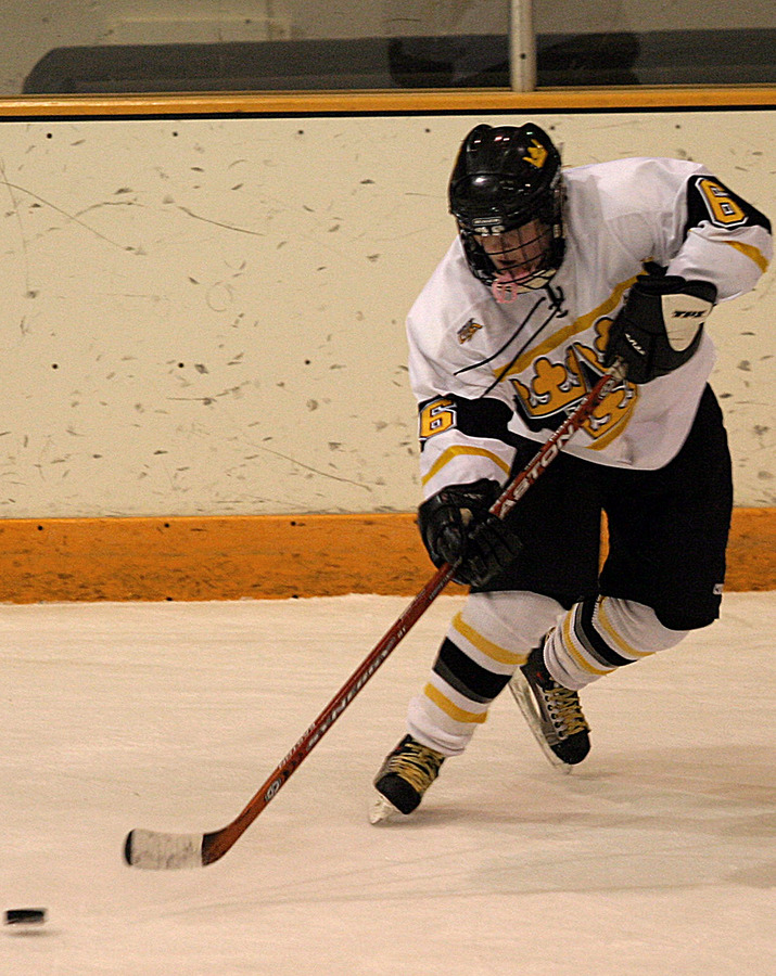 Jenny Pusch passes the puck during a power play.