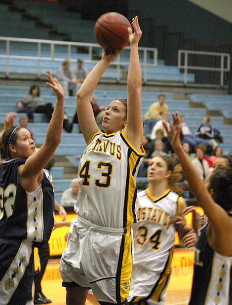 Katy Layman goes  up for two of her 15 points.