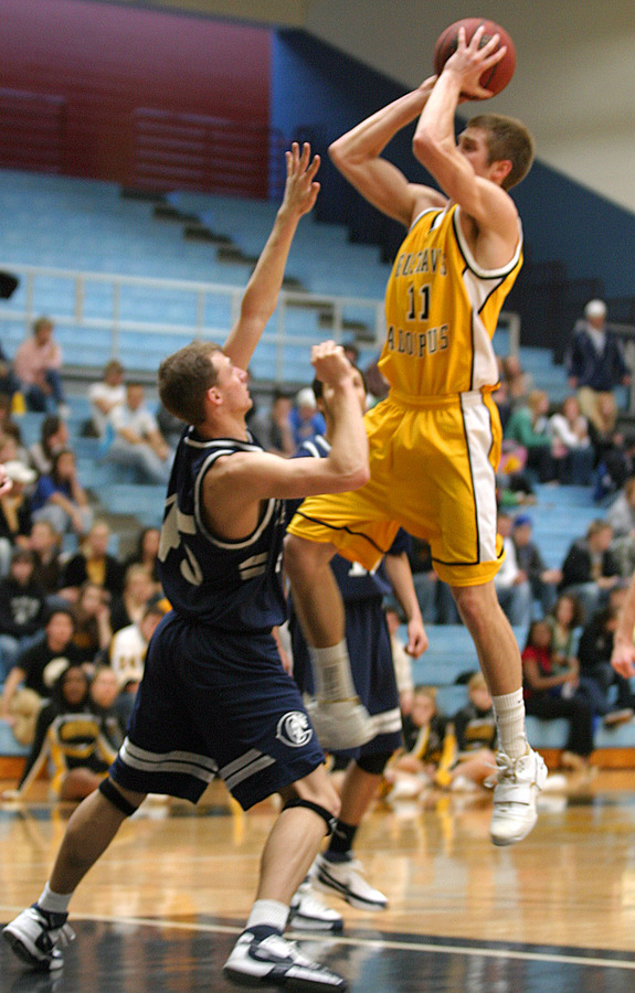 Wittwer goes up for two of his 1,143 career points against Carleton last Saturday.