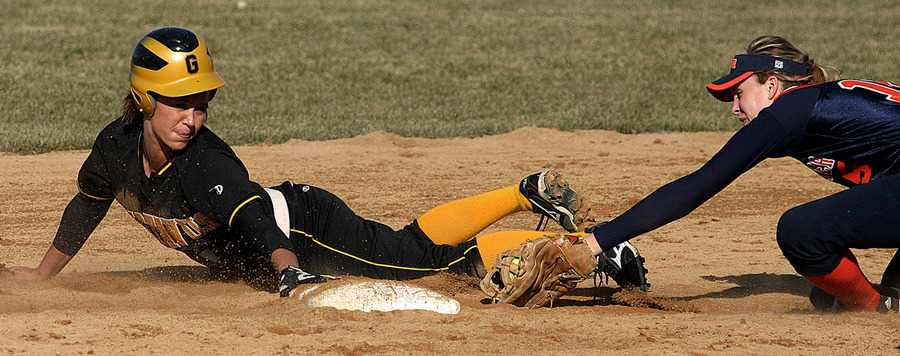 Emily Klein slides under a tag at second base.