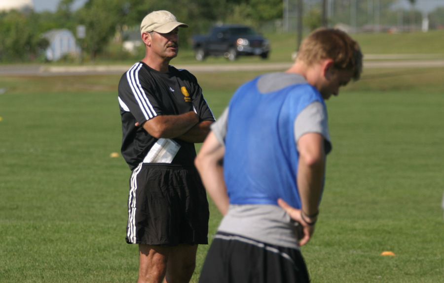 Coach Larry Zelenz watches practice