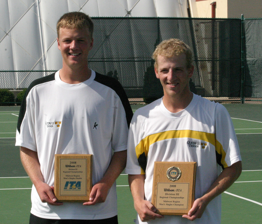 Charlie Paukert and John Kauss with their singles trophies.