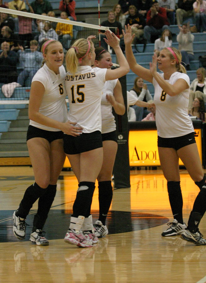 Olivia Warren is congratulated after putting down a kill.