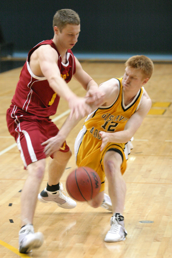 Mike DesLauriers works to get a bounce pass past a Concordia defender.