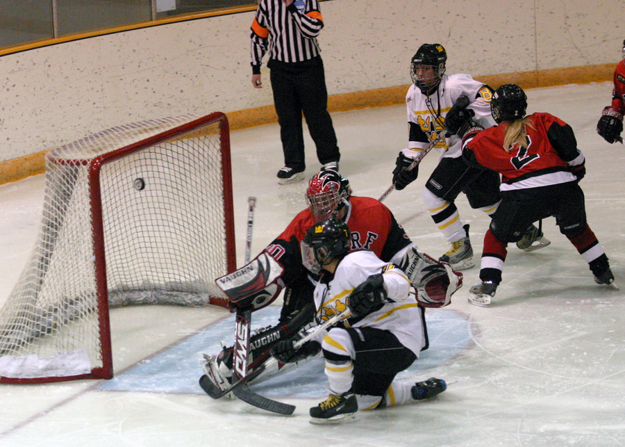 Kathryn DelZoppo deflects a pass from Mollie Carroll into the net for the Gusties first goal.