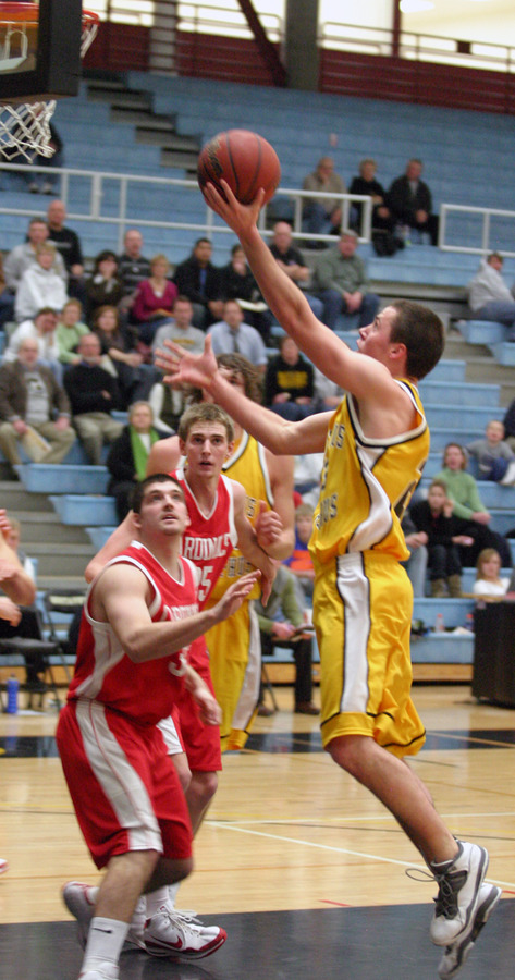Phil Wirtjes lays in two of his nine points in the second half.