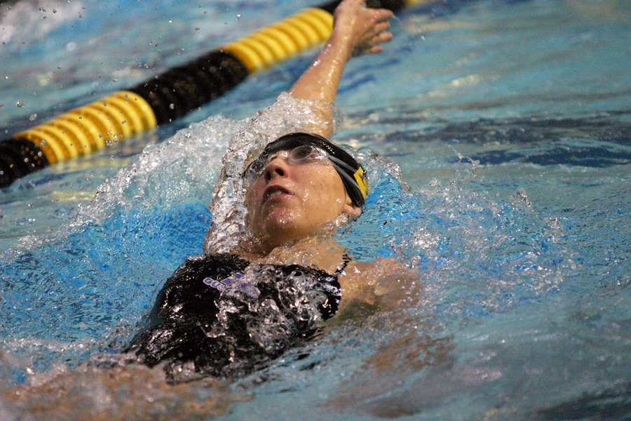 Mary Jo Behr heads to the finish in the backstroke.