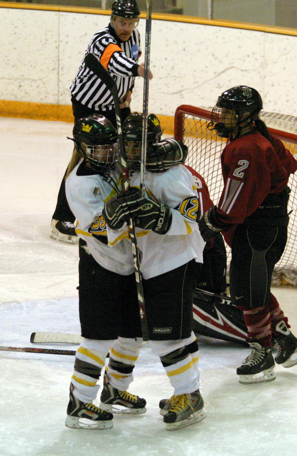 Alyssa Gaulrapp celebrates with Jessie Doig after Doig’s goal in the third period.