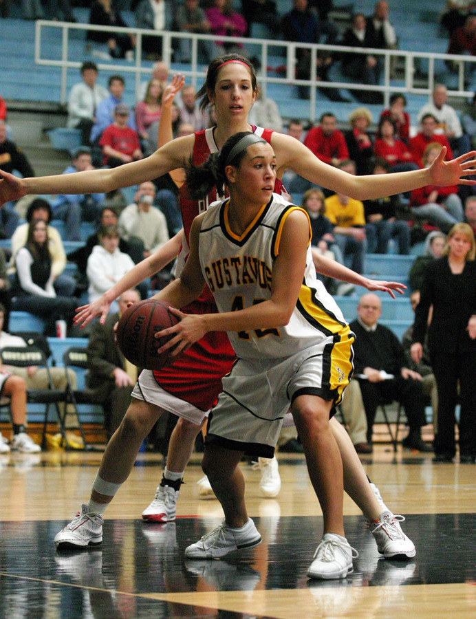 Ava Perry looks for a teammate after grabbing an offensive rebound.