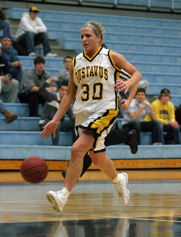Emily Nelson dribbles in for an uncontested layup after recording one of her three steals in the game.