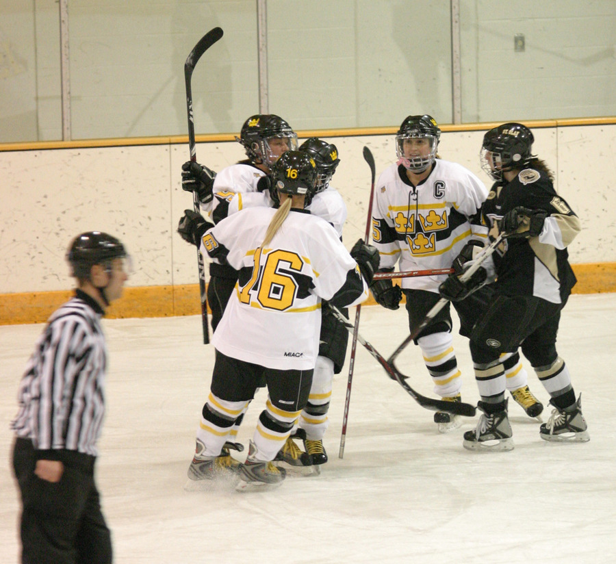 Gustavus celebrates Mari Gunderson’s goal late in the first period that gave the Gusties a 1-0 lead.