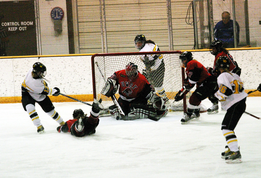 Jessie Doig fires a point blank shot at Cassie Campbell who comes up with the save.