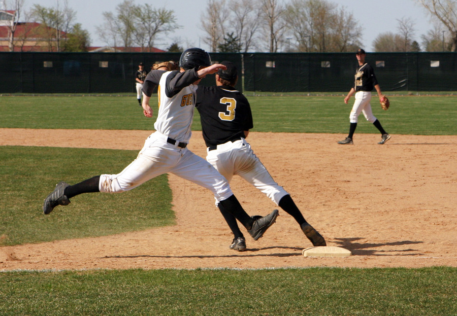 Mike DesLauriers tries to beat out the throw to first base.