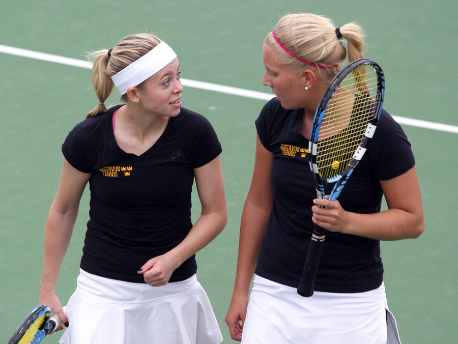 Krebsbach and Frank discuss strategy in their #1 doubles match.