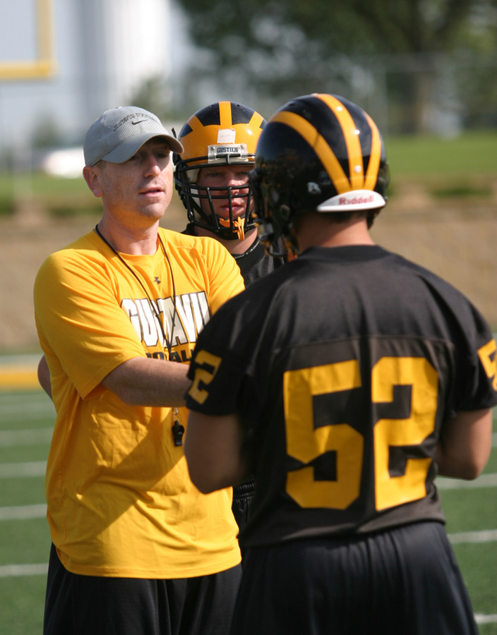 Defensive coordinator Brian Bergstrom working with his squad.