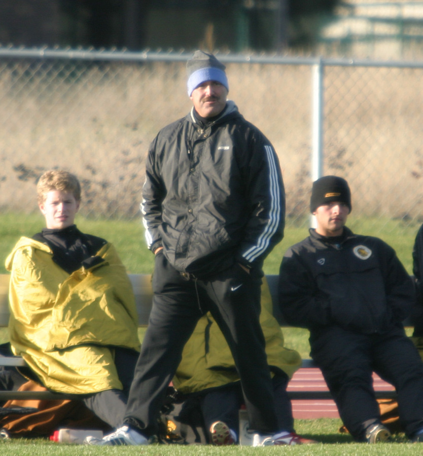 Coach Zelenz walks the sidelines during one of the home matches this past fall.
