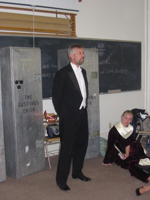 Dr. Aune talking to the choir before the performance.
