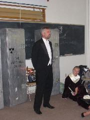 Dr. Aune talking to the choir before the performance.