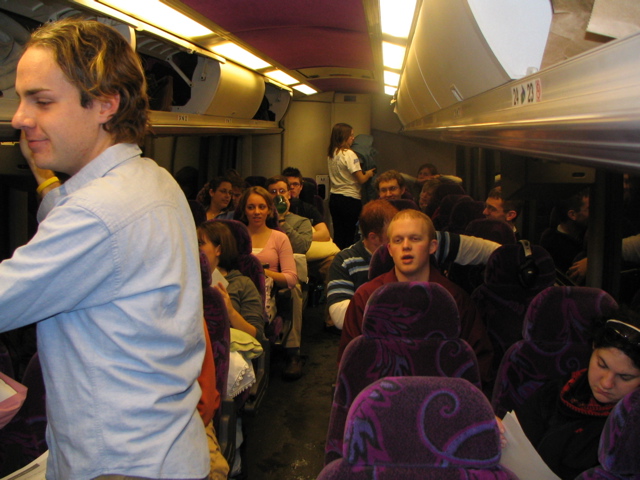 Getting comfortable in the bus.