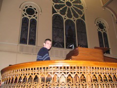 Sam trying out the piano