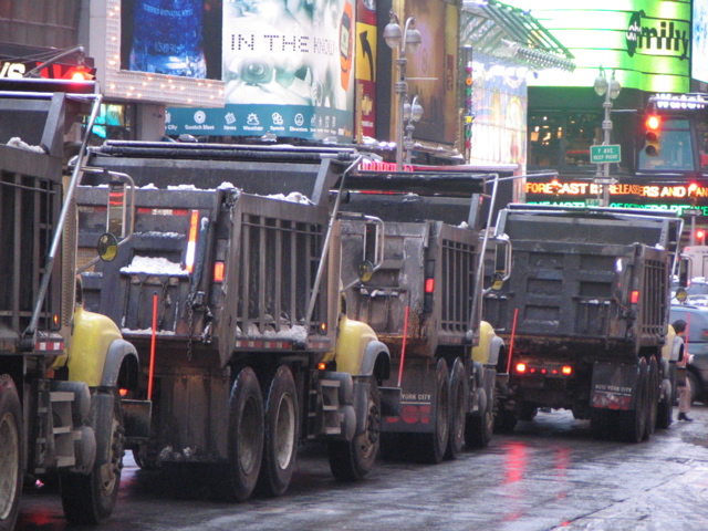 A fleet of dump trucks.