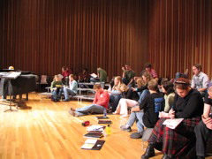 Studying some music during a break.