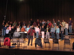Singing on the risers.