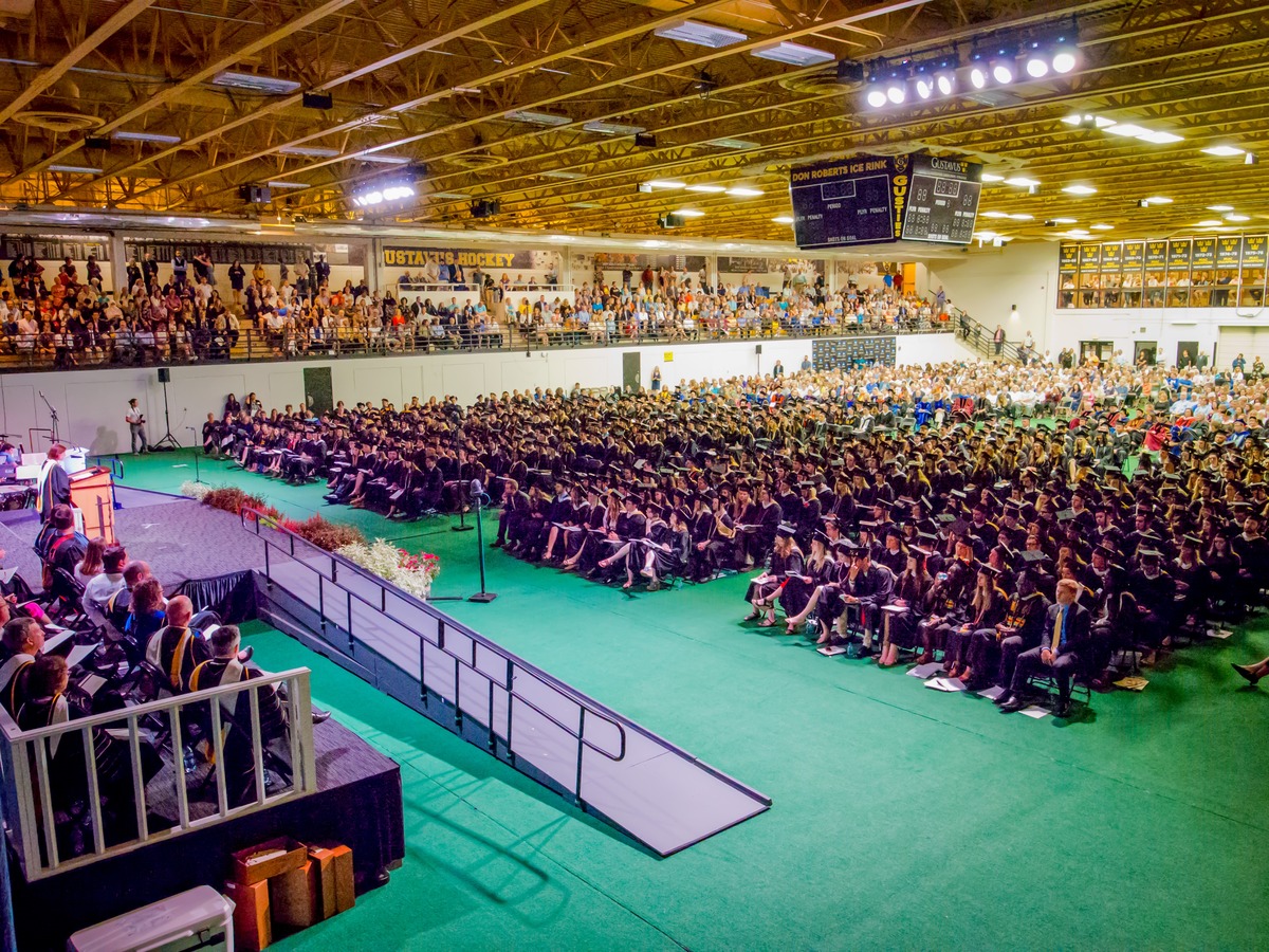 Graduates and audience at Commencement