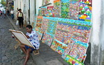 Photo gallery image named: painter_displays_his_wares_in_the_streets_of_salvador_-_brazil.jpg