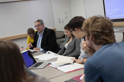 Greg Kaster leads a class discussion in his FTS class (Photo by Nick Theisen ’15).