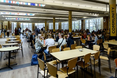 Students eating in the dining room