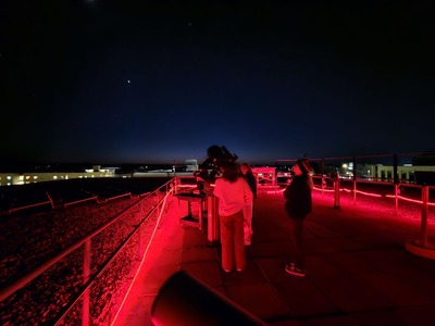 Students at the Olin Observatory at night