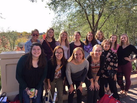 Here is a photo of an organization going to an educational conference. 