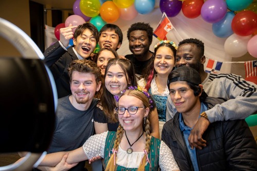 Students posing for camera at International Festival