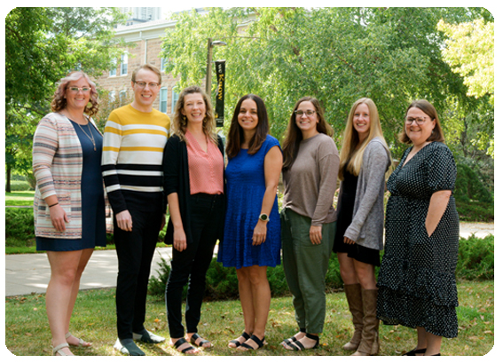 Counseling center staff in front of Old Main