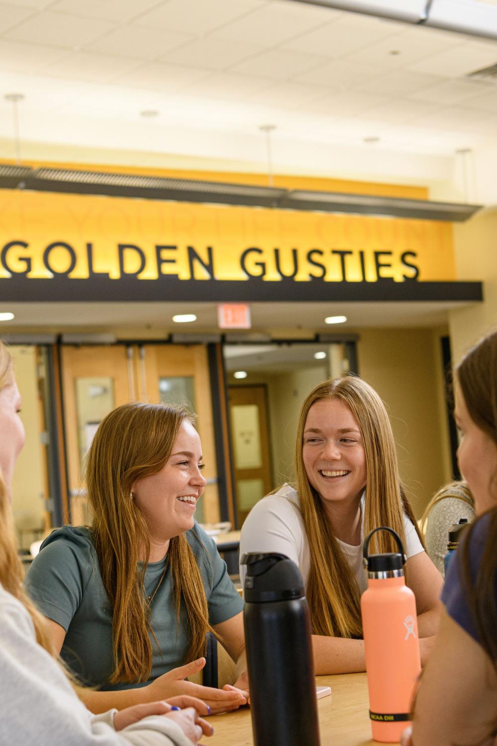 Students at table in dining room